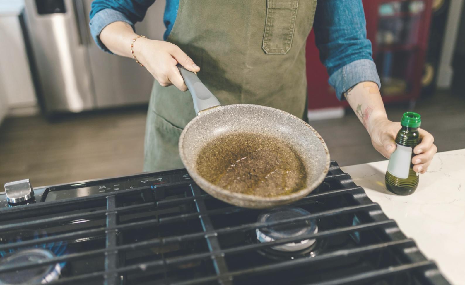 Professional event kitchen setup with fresh ingredients and cooking equipment